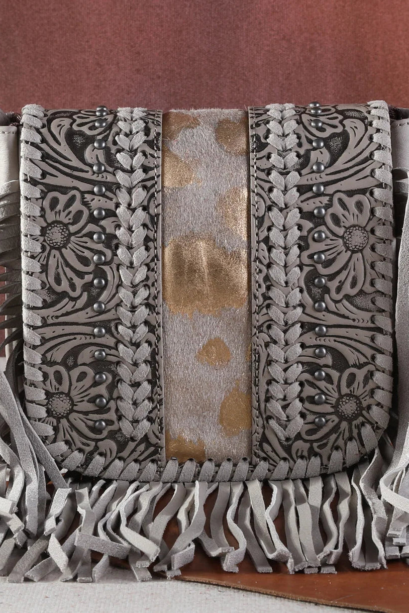 Trestles Clothing Company square crossbody bag with floral tooled leather, cowhide center, silver studs, and fringe.